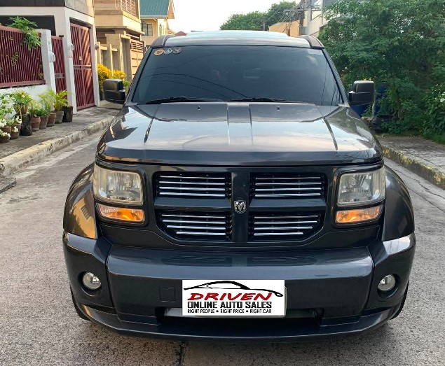 2011 DODGE NITRO SXT AT GAS (CASH BASIS ONLY) - Image 1